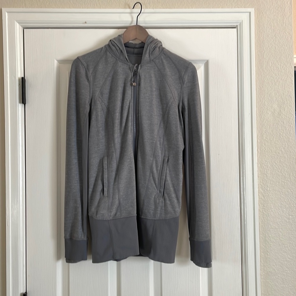 Long Gray Lululemon Hooded Jacket. See pictures for imperfections and wear.